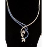 A diamond and sapphire set fronted 18ct white gold necklace,