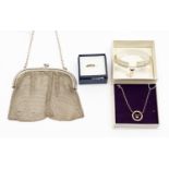 A London 1916 chain mail silver evening bag, an Emporio Armani silver pendant and chain,