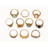 A collection of ten 9ct gold stone set rings, to include opal, citrine,