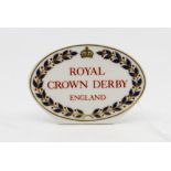 A 20th Century Royal Crown Derby Ceramic Point of Sale Plaque, date 20th century, marked, size 10.