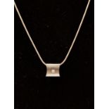 A diamond and 18ct white gold pendant, by Pascal of Harrods,