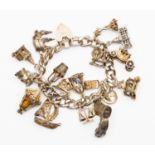 A silver charm bracelet together with 17 assorted silver charms
