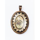 A 19th Century Masonic pendant, oval form with gilt metal with enamel details,