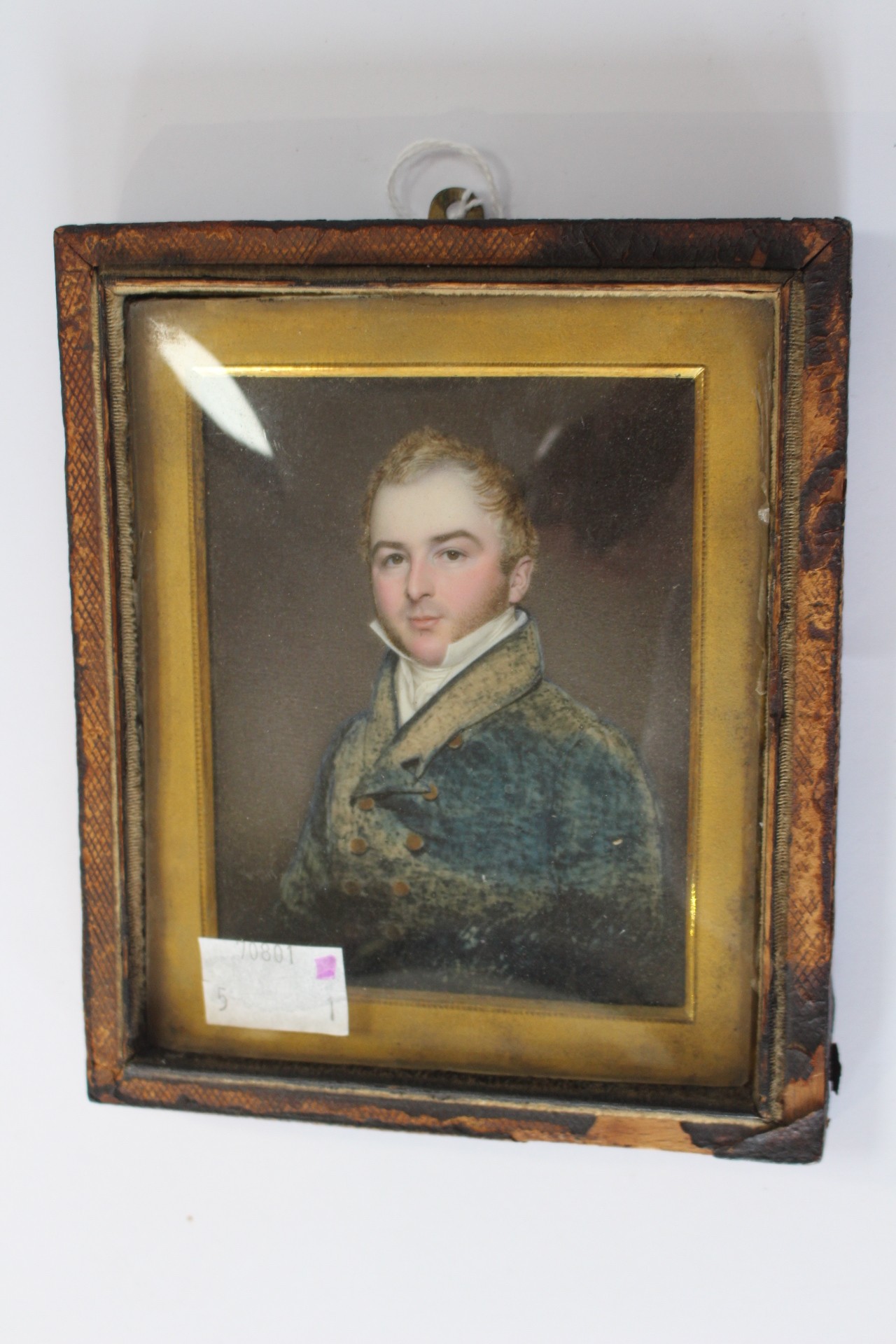 A mid 19th Century portrait miniature on ivory, a young gentleman, half length,