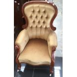 19th Century deep seated arm chair with gold button dralon