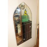 Timber framed Gothic arch wall mirror.