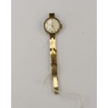 A 9ct gold Timor wristwatch, round dial, total gross weight approx 16.