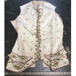 A late Georgian or early Regency waistcoat in a silk/taffeta fabric,