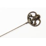 A Birmingham 1911 steel and Art Nouveau style silver finial long hat pin
