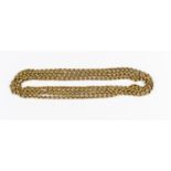 An unmarked yellow metal tests as 9ct gold, belcher guard chain, length approx 58",