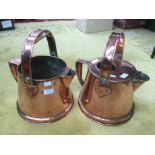 Pair of copper brewery hot water carriers,