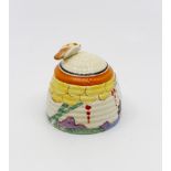 Clarice Cliff for Newport Pottery, a small Summerhouse beehive honey pot, Bizarre mark, 7.