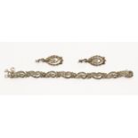A marcasite pair of earrings and a bracelet,