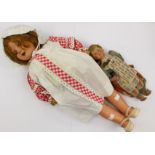 A circa 1940's costume doll, Italian origin, together with a mid 20th Century lady doll,