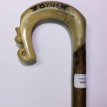 An Ian Taylor horn crook handle walking cane with Thistle design. Named "A Yates".