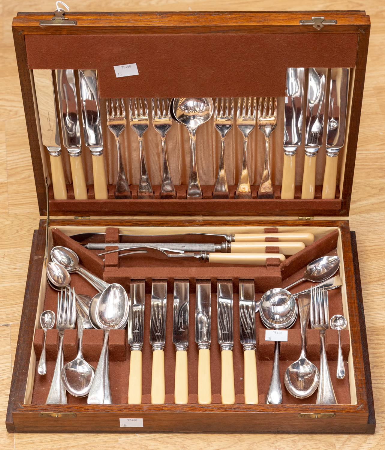 A boxed silver plated six serving cutlery canteen