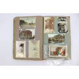 Early 20th Century postcard album within a scrapbook, plus loose cards,