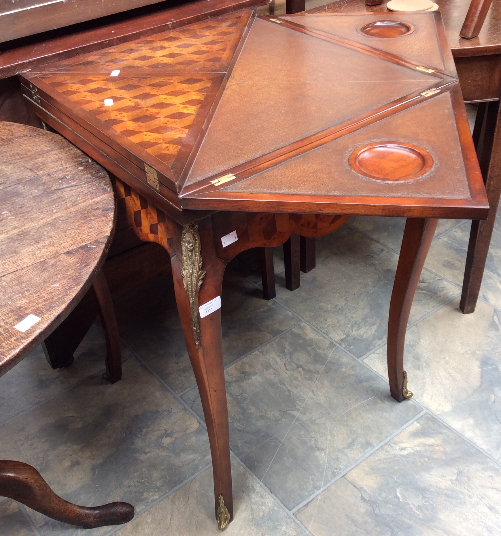 A 20th Century Envelope games table, complete with a Chinese games set,