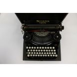 A cased 1930's Mercedes Superba portable typewriter