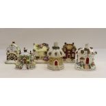 Six assorted ornamental cottages,