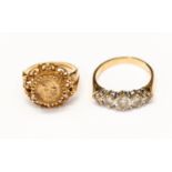 Two 9ct gold dress rings comprising a cubic zirconia 5 stone and a coin style ring,