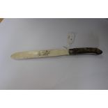 An ivory blade letter opener with Otter foot, caught at Swindon Wood November 6th 1876,