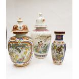 Two modern Japanese large baluster jars and covers together with a baluster vase (3)