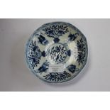 An 18th century Chinese blue and white bowl with inverted rim and the main body decorated with