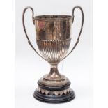An Edwardian presentation silver two handled cup, loop handles on raised circular foot, London 1909,
