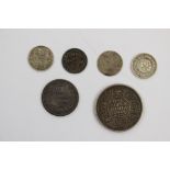 A collection of various silver coins, including one Rupee India, 1916, a Victoria shilling 1870,