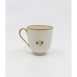 A Derby porcelain 129 pattern coffee cup, circa 1790, moulded fluting and floral sprigs, puce mark,