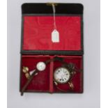 A jewellery box containing a rose metal 1930's watch along with a white metal pocket watch and two