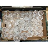 A collection of assorted drinking glasses, including hock glasses, port glasses,