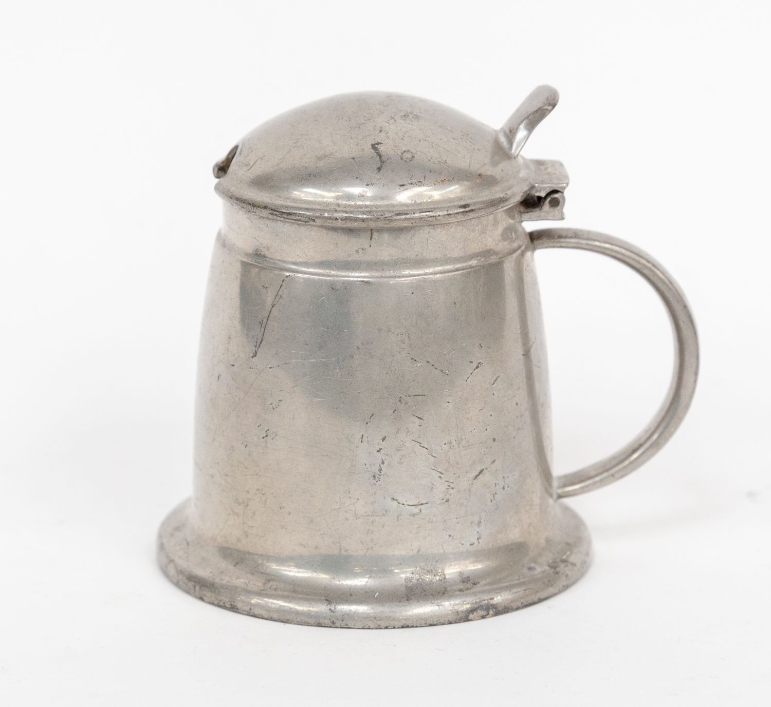 Tudric pewter mustard pot in shape of handled tankard with green glass insert pot