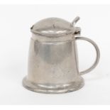 Tudric pewter mustard pot in shape of handled tankard with green glass insert pot