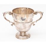 IRISH INTEREST: A George II Irish silver twin handled loving cup,