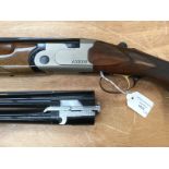 12 Bore Over & Under Shotgun by Axiom. 2 & 3/4 and 3 inch chambers. 28 inch barrels.