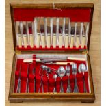 An oak cased canteen of cutlery with fish eaters and carving set, EPNS 1958 circa,