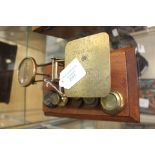 Social history interest; a set of postal scales circa 1880, mounted on an oak stand,