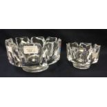 A pair of graduated orrefors cut glass bowls, flared form, signed to base,