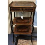 A late 19th Century marquetry veneered three tier whatnot,
