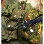 A "Snugpak" padded jacket, olive green reversible to DPM camoflauge pattern.