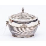 A silver tea caddy