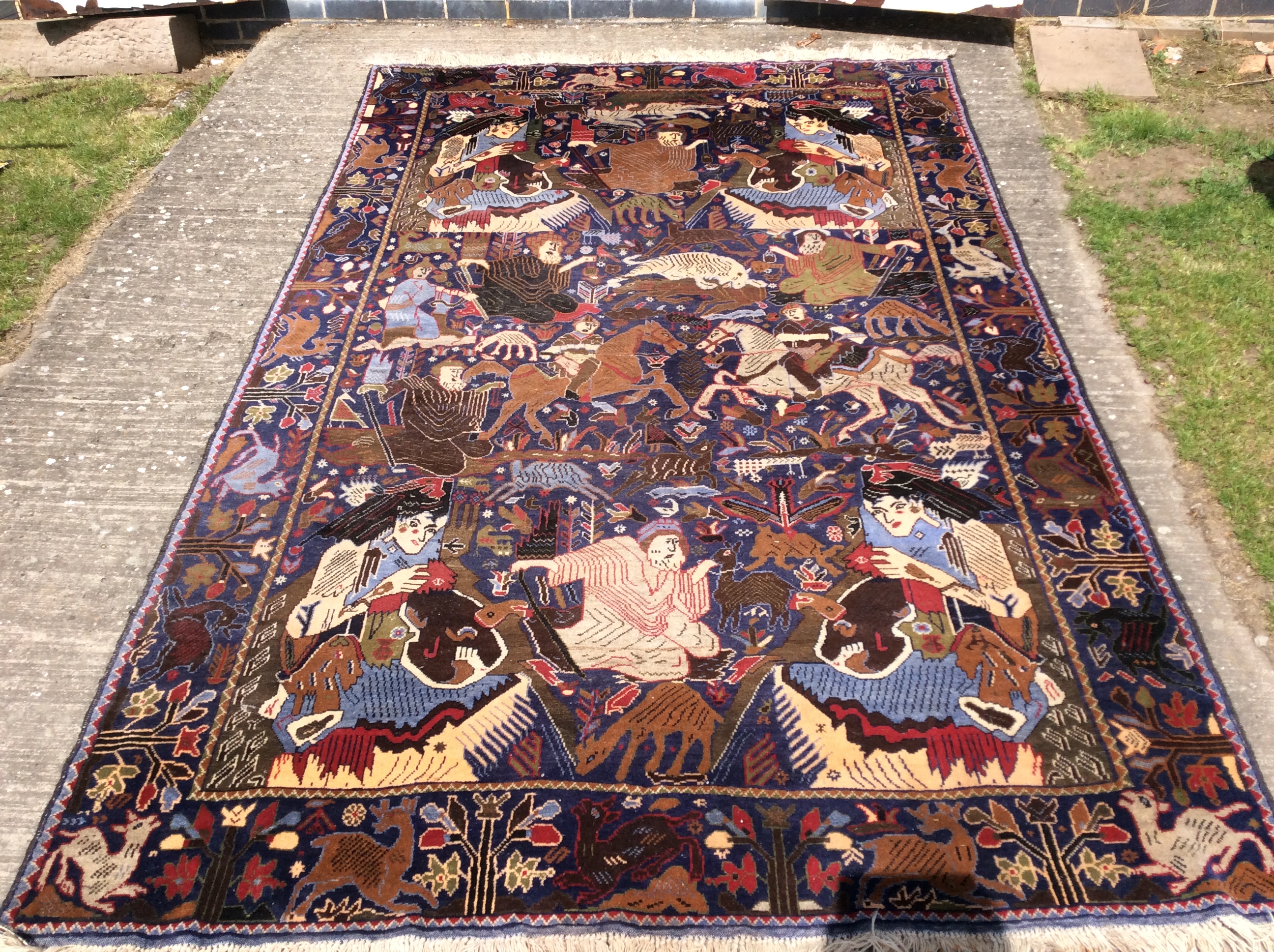 An Persian Afghan hand knotted woollen rug, early 20th Century,