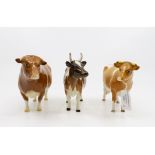 J Beswick Jersey bull and cow along with another Condition: Cow: brown head: both horns broken off