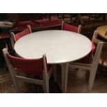 A late 20th Century white Swedish modern design table and four matching chairs (5) Please note: