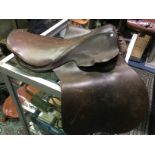 Equestrian interest: Brown leather horse riding saddle. No makers marking.