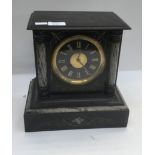 A late Victorian Boxell slate eight day mantle clock,