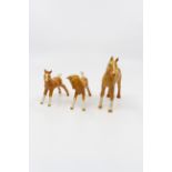 A set of three Beswick horses