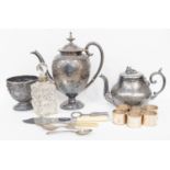 An EPNS water jug and bowl, six napkin rings, a silver spoon,